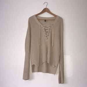 Beige Knit sweater with tie detailing